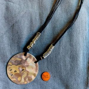 Hammered silver pendant